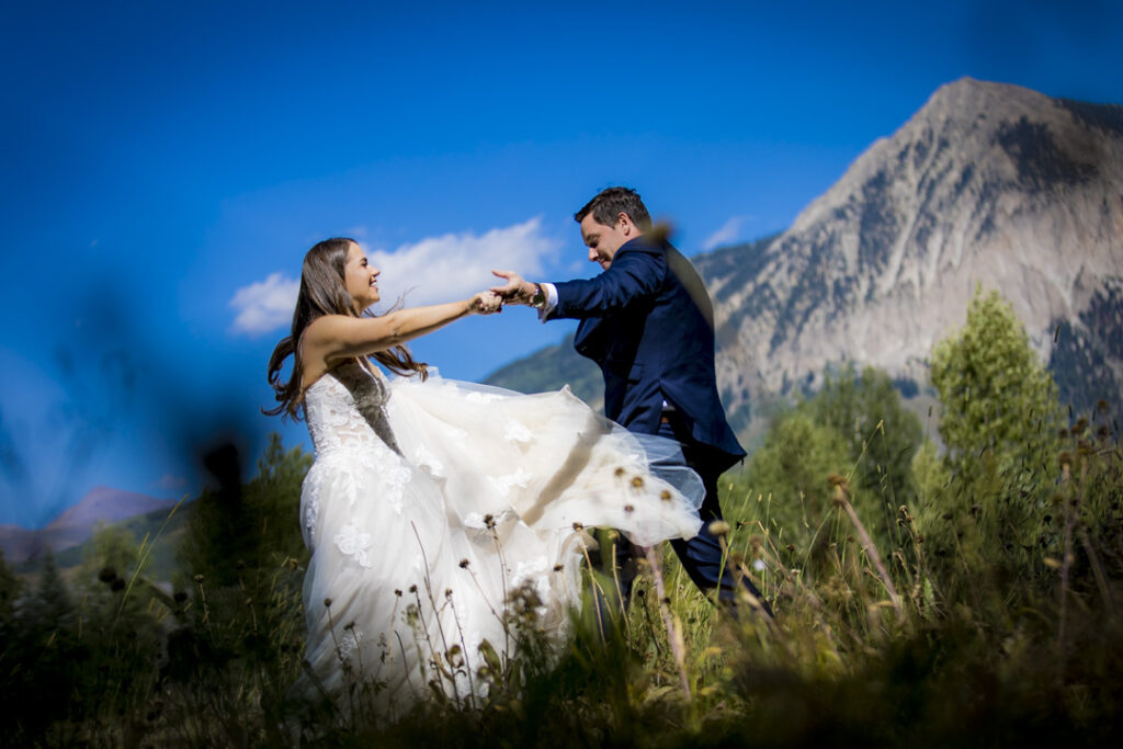 A couple's dance in the outdoors before their wedding