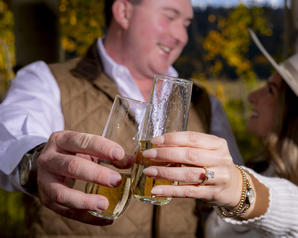cheers to a proposal and engagement session in crested butte