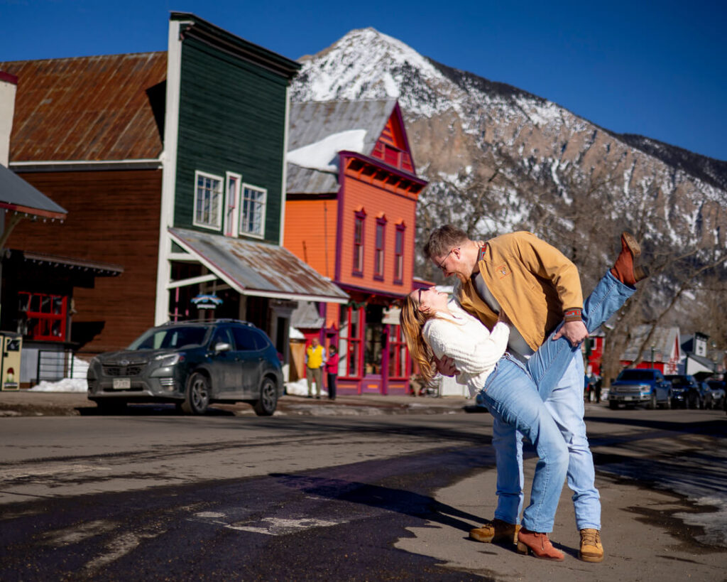 Engagement Photos in the town of Crested Butte on Elk Avenue