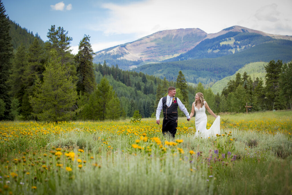 hire a local photographer for your beautiful wedding day portraits in front of Red Lady Mountain